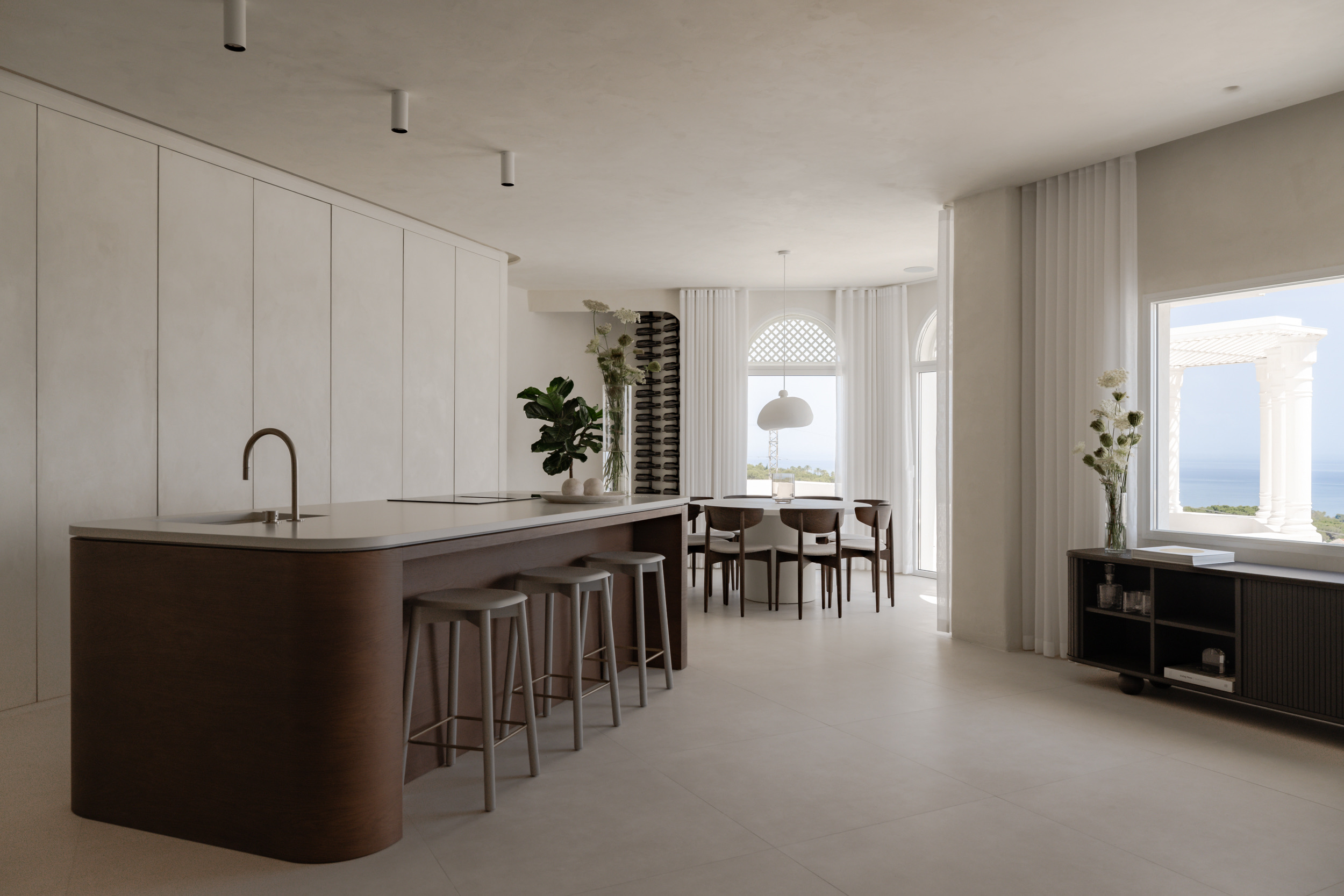 Oía Penthouse kitchen and dining area with sea views