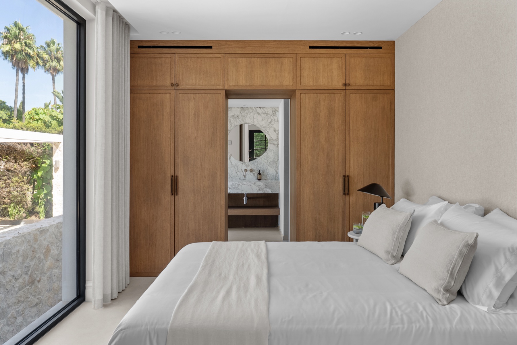 Villa Siena guest bedroom and bespoke oak wardrobes