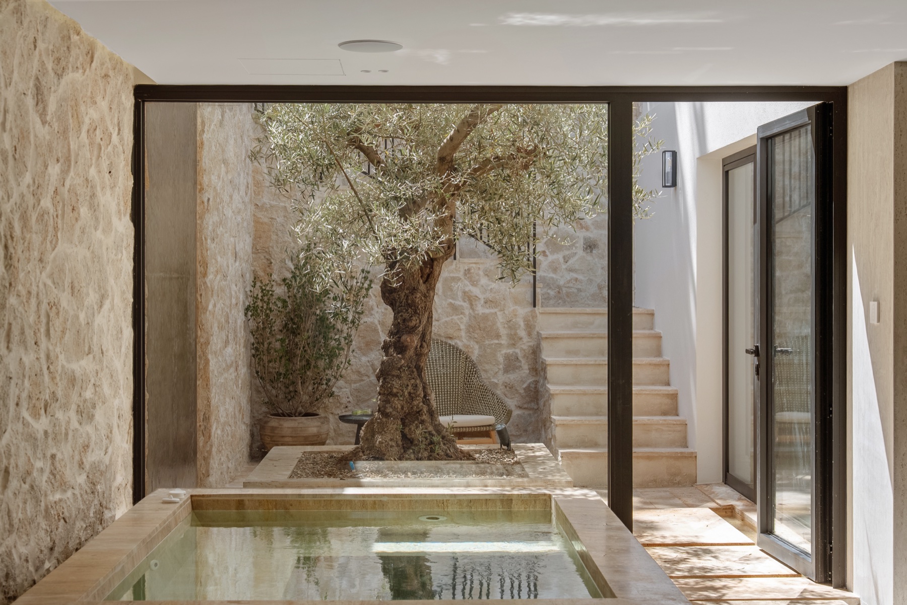 Villa Siena indoor pool and olive courtyard